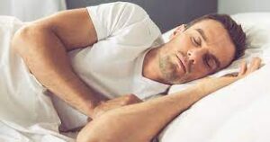Man asleep with sleep apnea