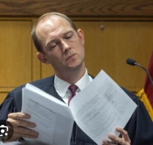 Administrative Law Judge Reviewing a File